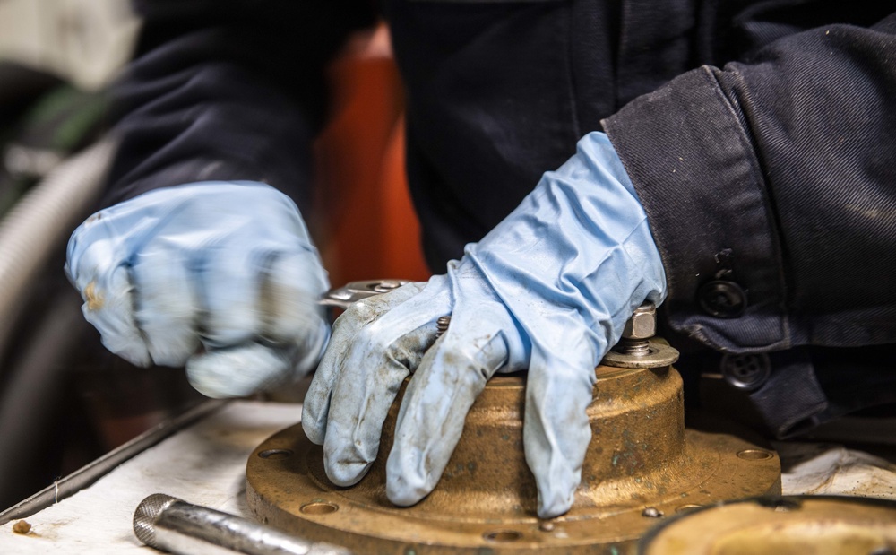 Sailors Aboard USS Milius (DDG 69) Conduct Repairs in the Main Engine Room