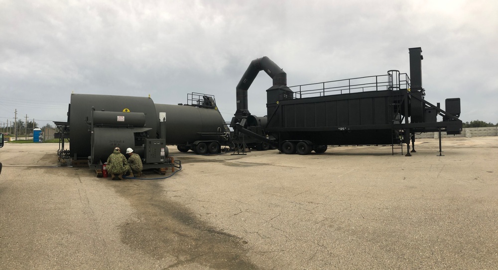 NMCB-5’s Detail Guam performs turnover procedures on the Asphalt Batch Plant to support Naval Base Guam.