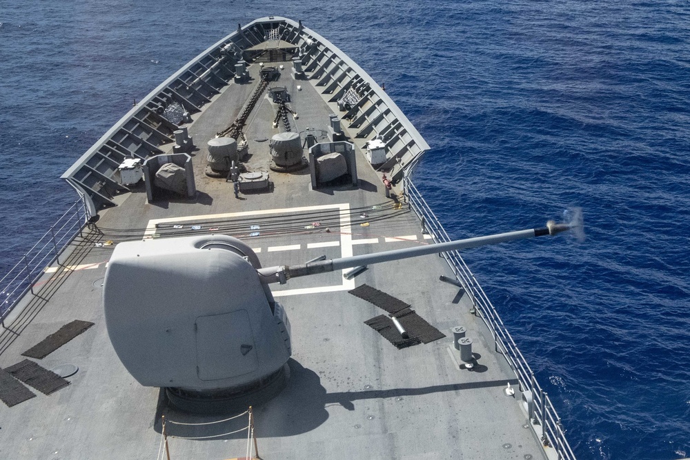 USS Antietam (CG 54) fires ordnance from a Mark 45 5 inch gun weapon system