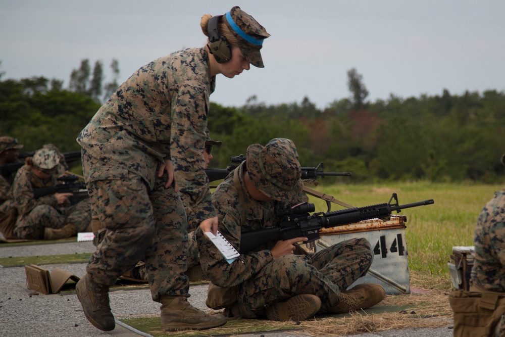 Marksmanship Coaches Course students assist in live rifle range qualifications