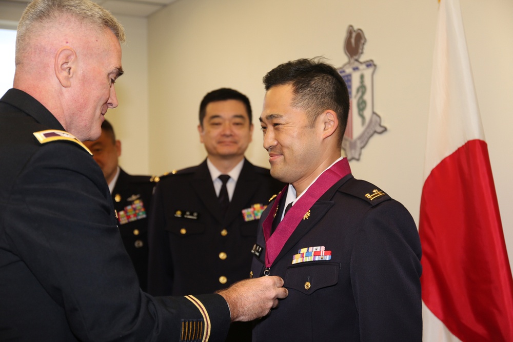 JGSDF medical liaison officer inducted into Order of Military Medical Merit