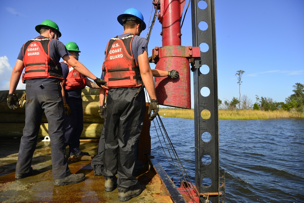 Smilax crews maintain aids to navigation near Fort Macon, North Carolina