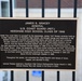 Admiral Gracey Way plaque dedicated to retired Coast Guard members accomplishments