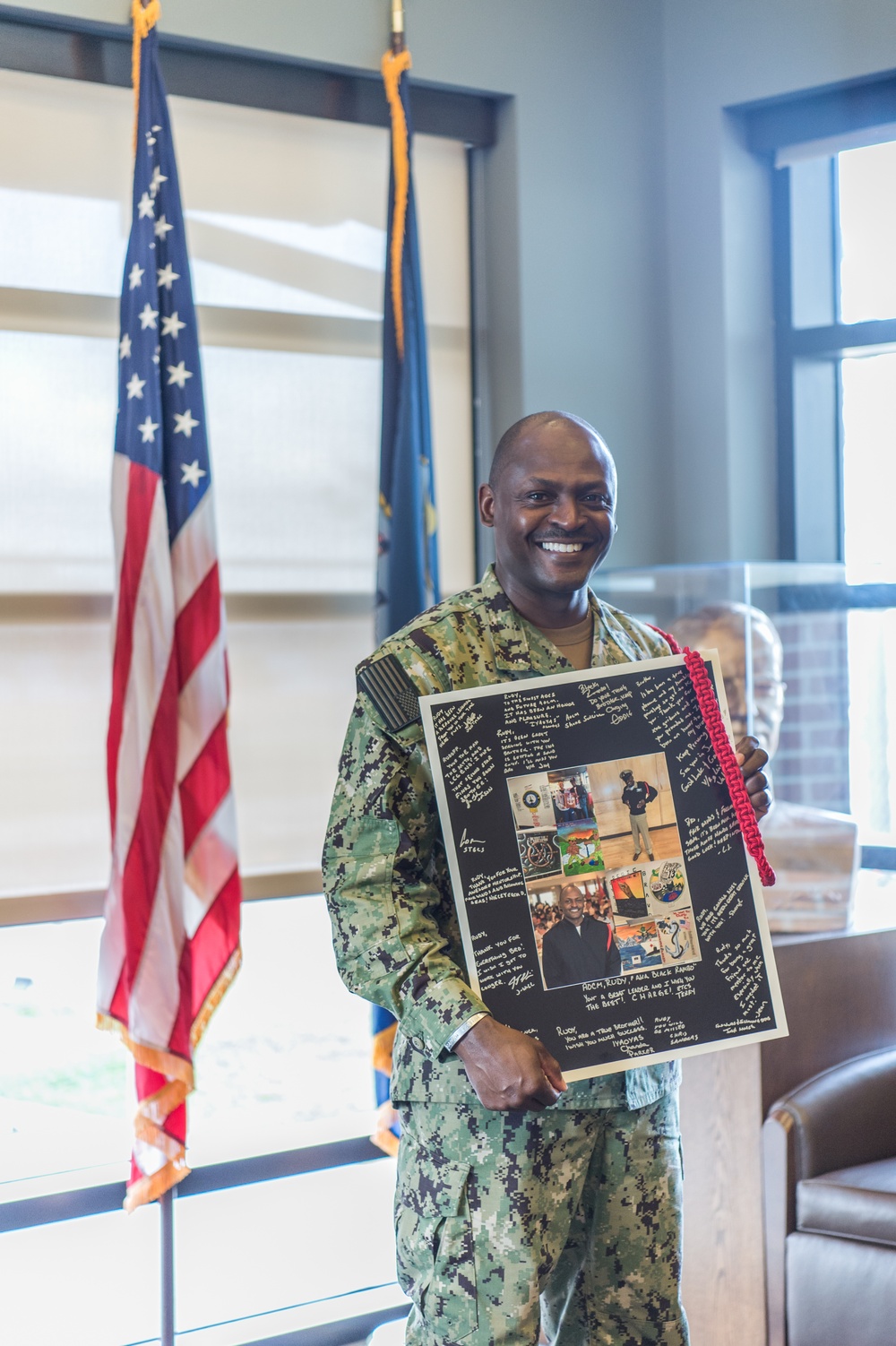 191028-N-TE695-0005 NEWPORT, R.I. (Oct. 28, 2019) -- Senior Chief Aviation Ordnanceman Rudoff L. Liverpool receives end of tour award