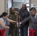 Marines, civilians celebrate mini mart opening at comm facility