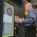 Marines, civilians celebrate mini mart opening at comm facility