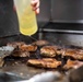 Sailors Aboard USS Milius (DDG 69) Prepare Dinner in the Wardroom Galley