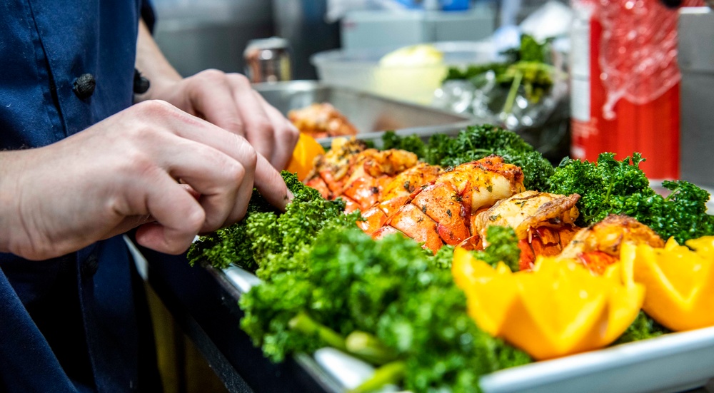 Sailors Aboard USS Milius (DDG 69) Prepare Dinner in the Wardroom Galley