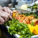 Sailors Aboard USS Milius (DDG 69) Prepare Dinner in the Wardroom Galley