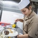 Sailors Aboard USS Milius (DDG 69) Prepare Dinner in the Wardroom Galley