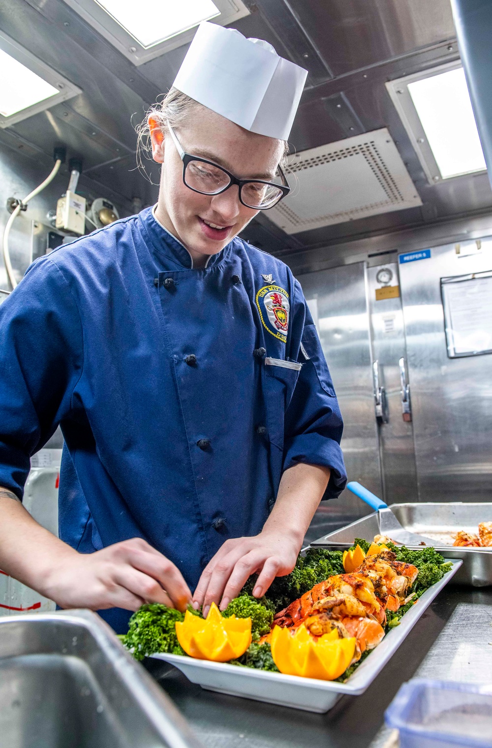 Sailors Aboard USS Milius (DDG 69) Prepare Dinner in the Wardroom Galley