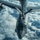 An aerial refueling operation is taking place between two U.S. Air Force aircraft above a cloud layer. A B-52 Stratofortress bomber is receiving fuel from a tanker aircraft, identifiable by the '100 ARW' markings indicating the 100th Air Refueling Wing. The photo is taken from the tanker's boom operator perspective looking down at the receiver aircraft.
