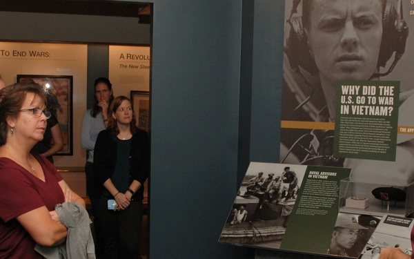 Military Aviation Museum staff members tour Naval Museum