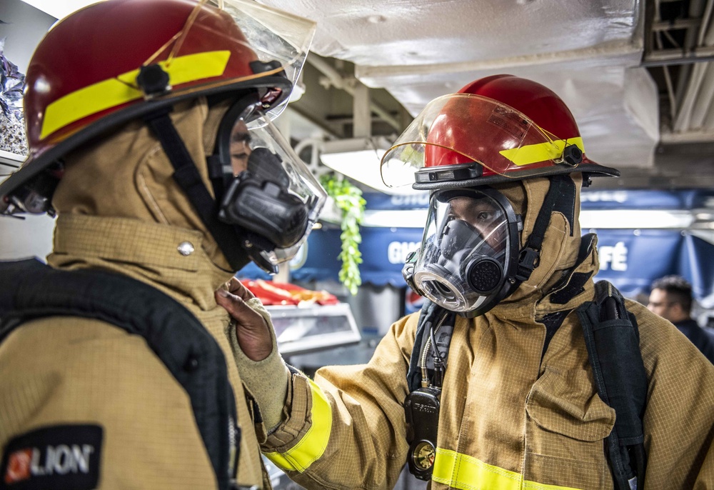 Sailors Aboard USS Milius (DDG 69) Participate in a Damage Control Drill