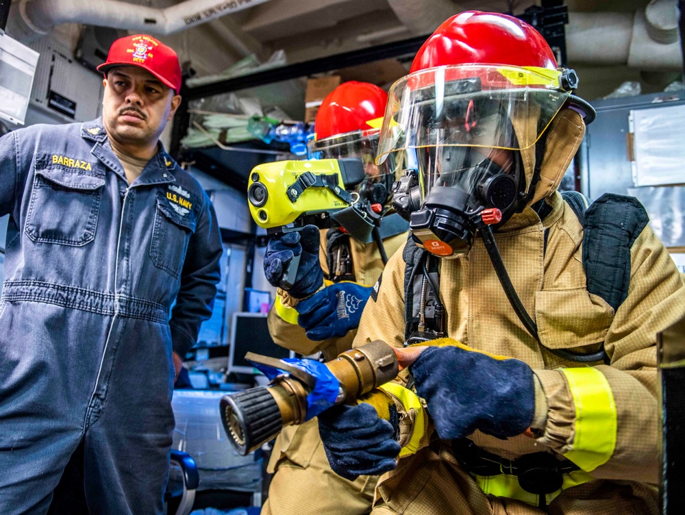 Sailors Aboard USS Milius (DDG 69) Participate in a Damage Control Drill