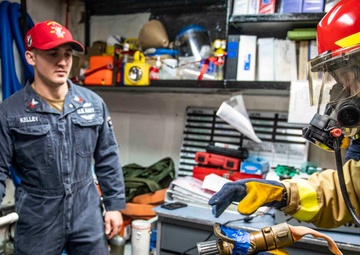 Sailors Aboard USS Milius (DDG 69) Participate in a Damage Control Drill