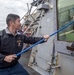 Sailors Aboard USS Milius (DDG 69) Participate in a Fresh Water Wash-down