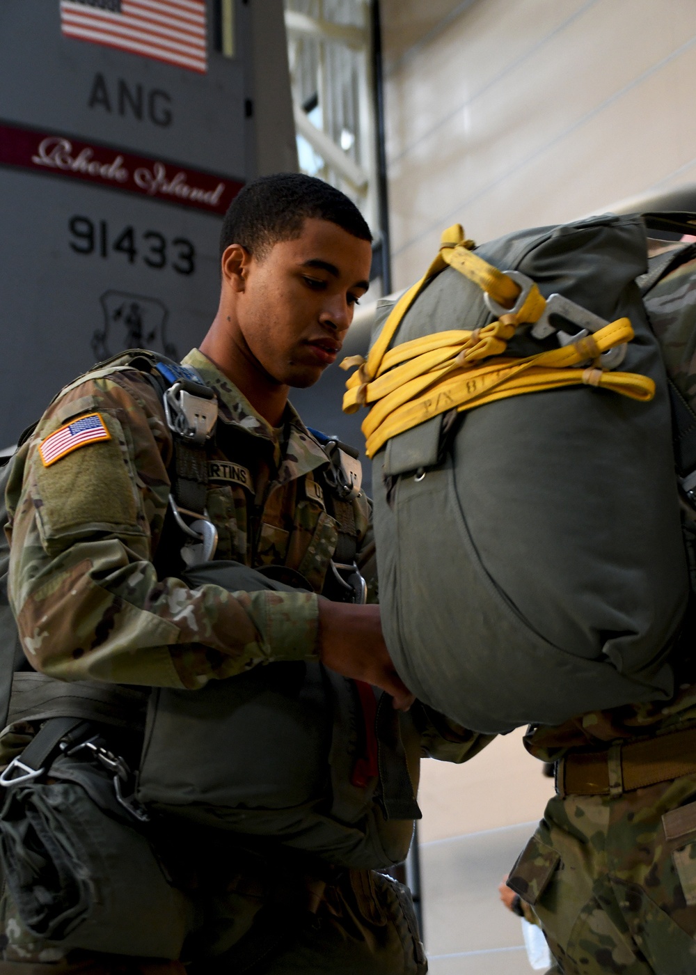 The 143d Airlift Wing, 1/143d Charlie Co. Infantry Airborne, Team Up for High Performance Tactical Night Jump Training