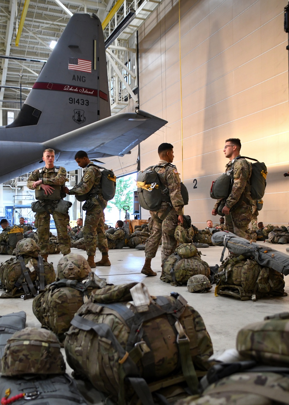 The 143d Airlift Wing, 1/143d Charlie Co. Infantry Airborne, Team Up for High Performance Tactical Night Jump Training