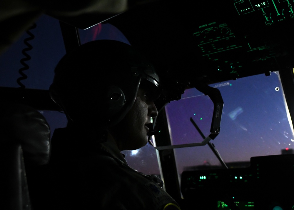 The 143d Airlift Wing, 1/143d Charlie Co. Infantry Airborne, Team Up for High Performance Tactical Night Jump Training