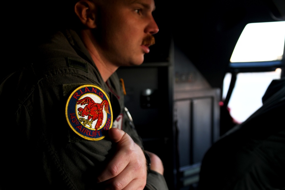 The 143d Airlift Wing, 1/143d Charlie Co. Infantry Airborne, Team Up for High Performance Tactical Night Jump Training