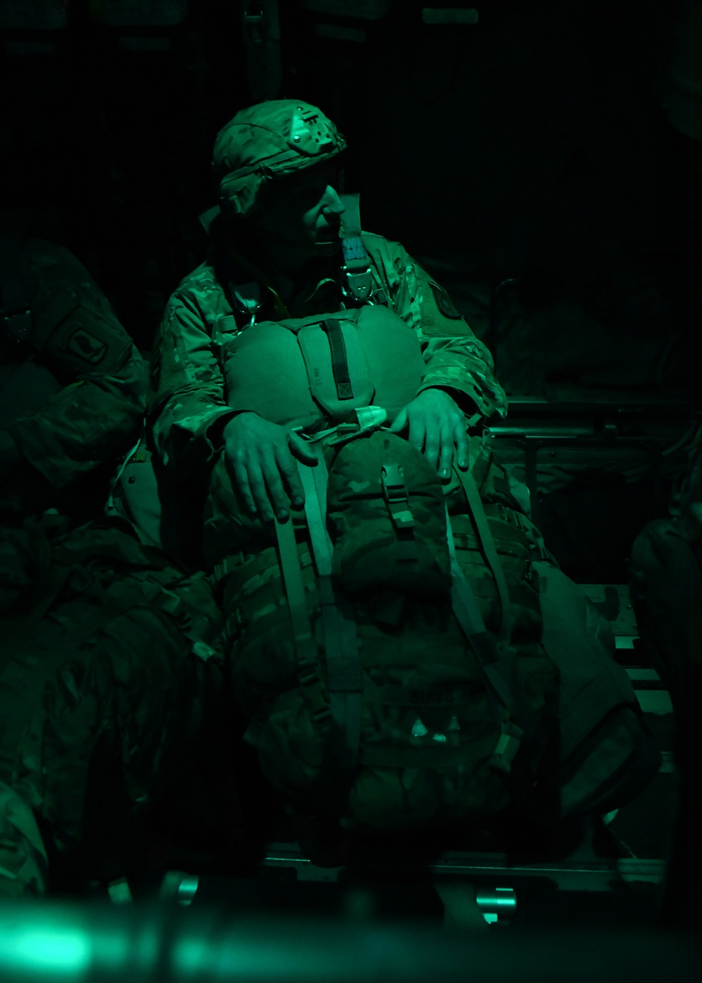 The 143d Airlift Wing, 1/143d Charlie Co. Infantry Airborne, Team Up for High Performance Tactical Night Jump Training