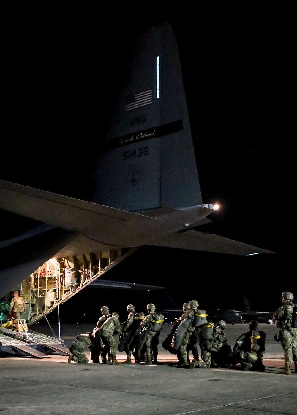 The 143d Airlift Wing, 1/143d Charlie Co. Infantry Airborne, Team Up for High Performance Tactical Night Jump Training