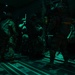 The 143d Airlift Wing, 1/143d Charlie Co. Infantry Airborne, Team Up for High Performance Tactical Night Jump Training