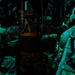 The 143d Airlift Wing, 1/143d Charlie Co. Infantry Airborne, Team Up for High Performance Tactical Night Jump Training