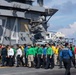 U.S. Sailors participate in a foreign object debris (FOD) walkdown