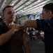 Sailor delivers flu shot