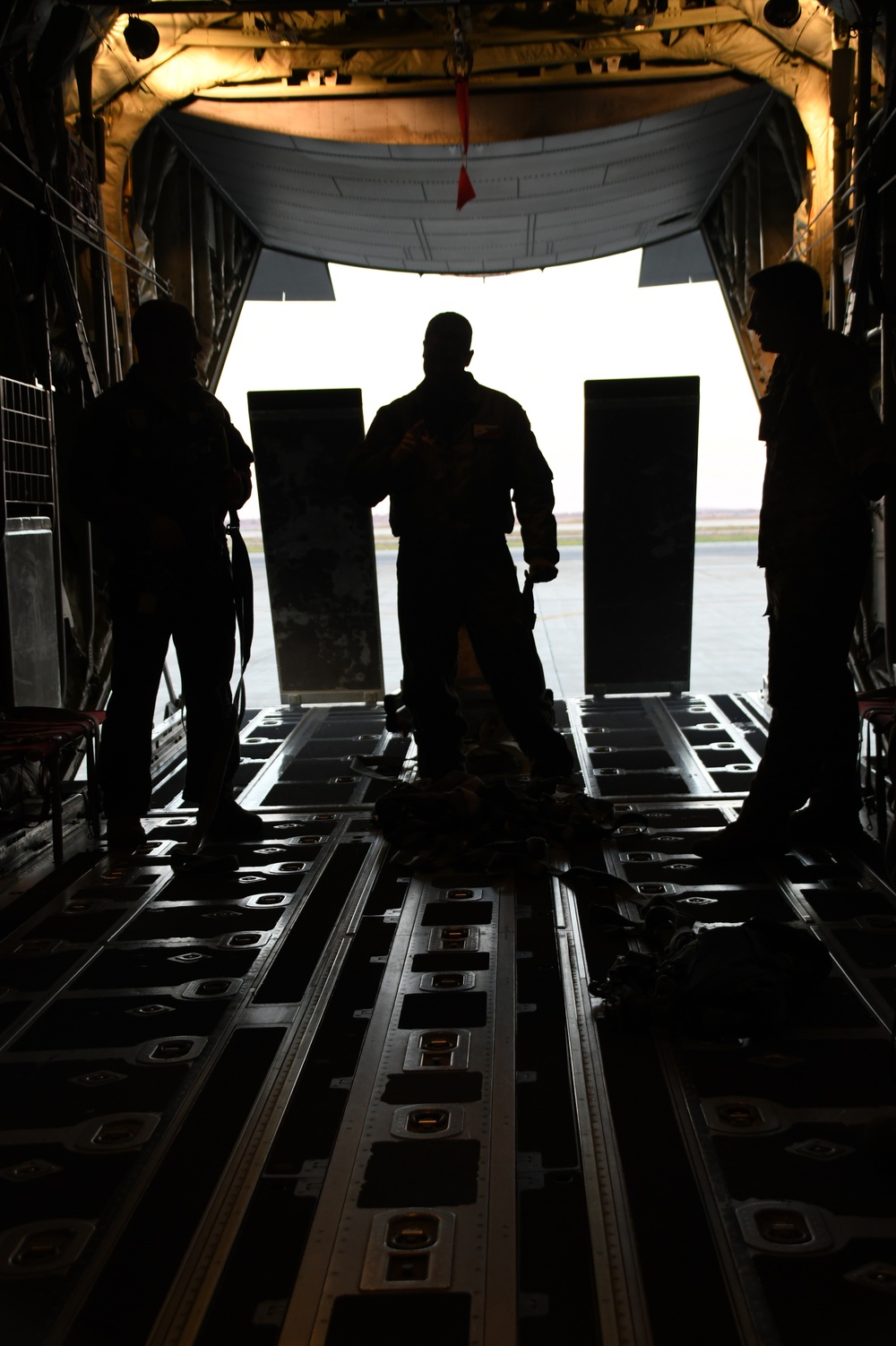 The 143d Airlift Wing, 1/143d Charlie Co. Infantry Airborne, Team Up for High Performance Tactical Night Jump Training