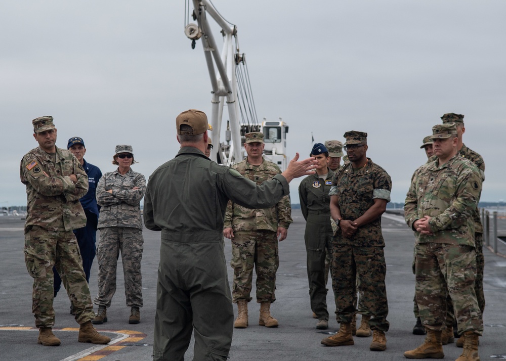 Members of the Joint Forces Staff College visit the aircraft carrier USS John C. Stennis (CVN 74)