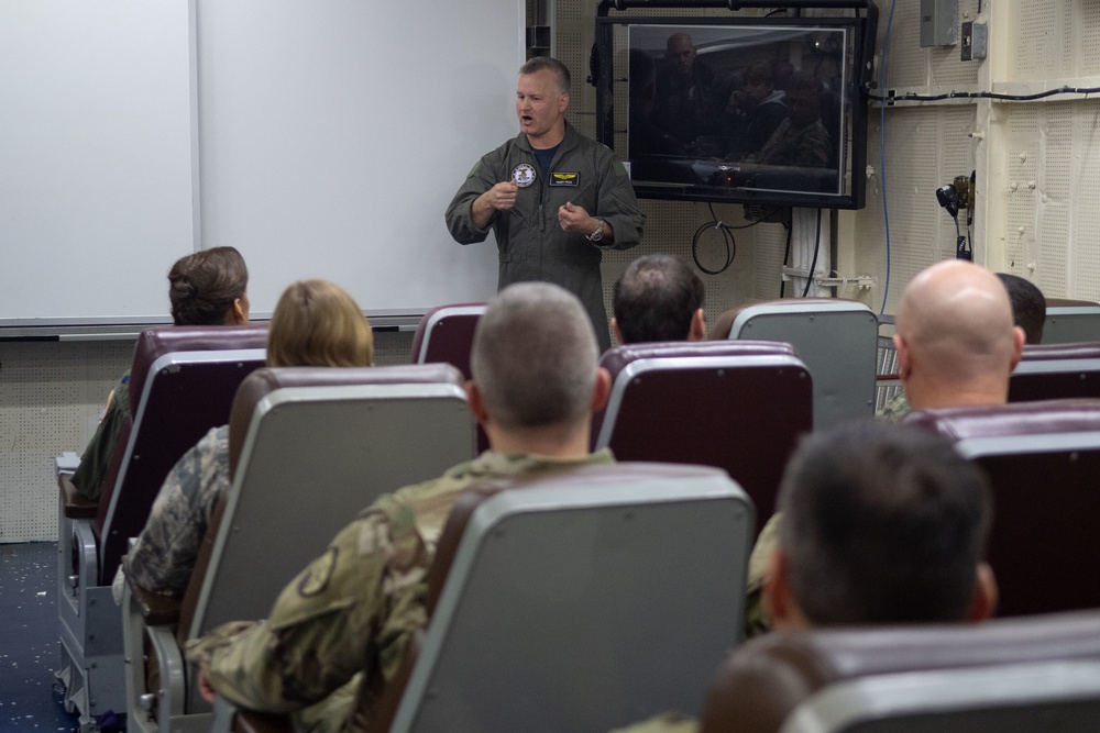 Members of the Joint Forces Staff College visit the aircraft carrier USS John C. Stennis (CVN 74)