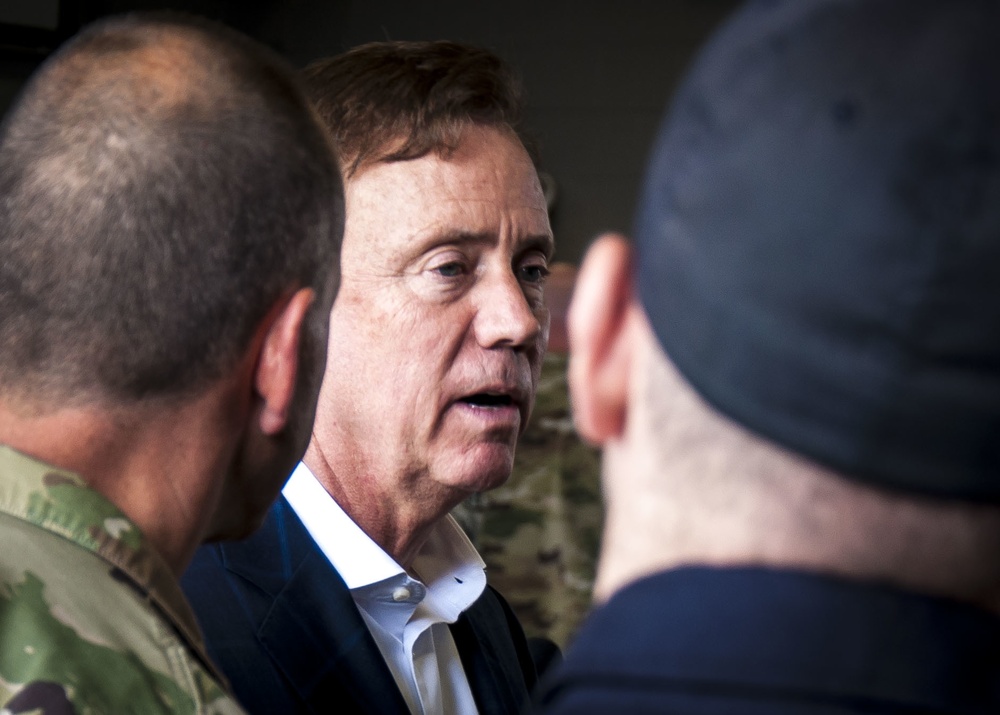 Gov. Lamont visits troops who  assisted with B-17 crash recovery