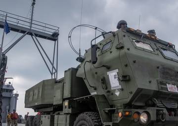 Marine HIMARS and Army Landing Craft conduct joint amphibious training