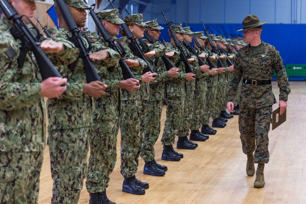 191031-N-TE695-0012 NEWPORT, R.I. (Oct. 31, 2019) -- Navy Officer Candidate School students perform drill and ceremony