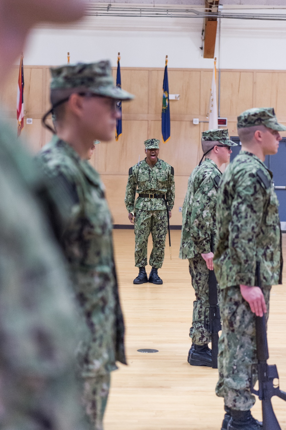 191031-N-TE695-0013 NEWPORT, R.I. (Oct. 31, 2019) -- Navy Officer Candidate School students perform drill and ceremony