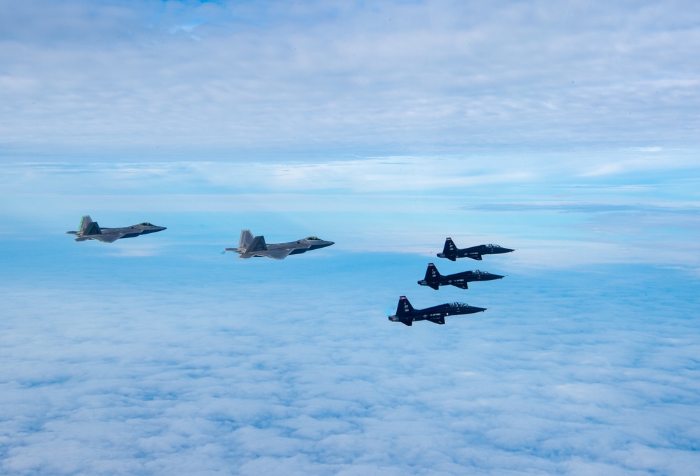 &quot;First to the Fight&quot;: F-22 Raptor and T-38 Talon train over Atlantic