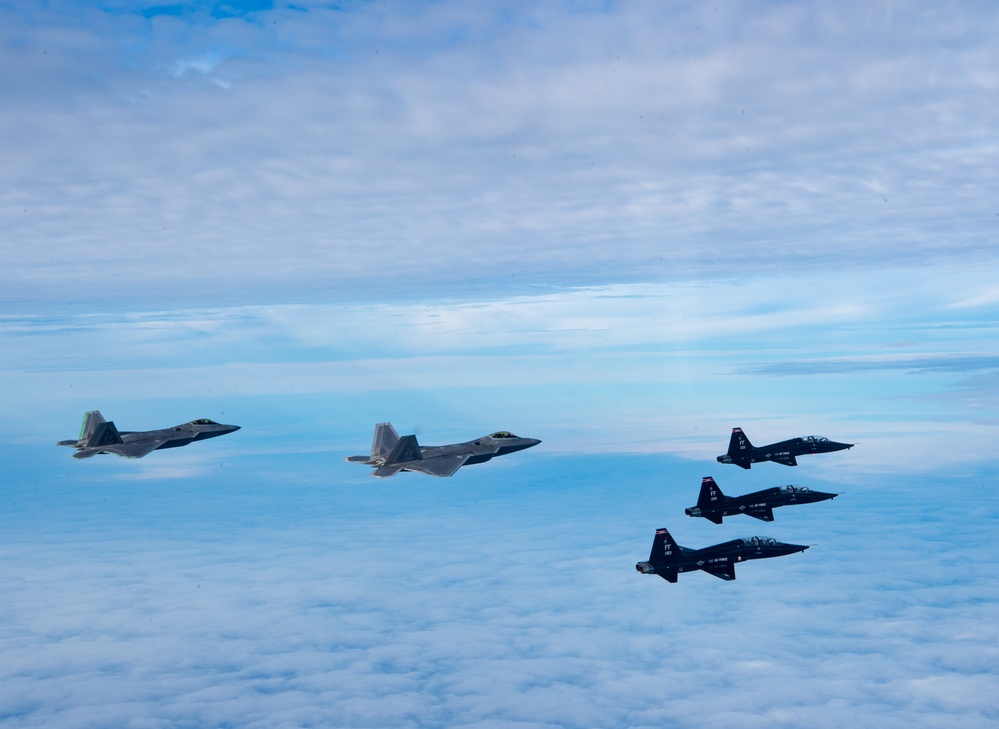 &quot;First to the Fight&quot;: F-22 Raptor and T-38 Talon train over Atlantic