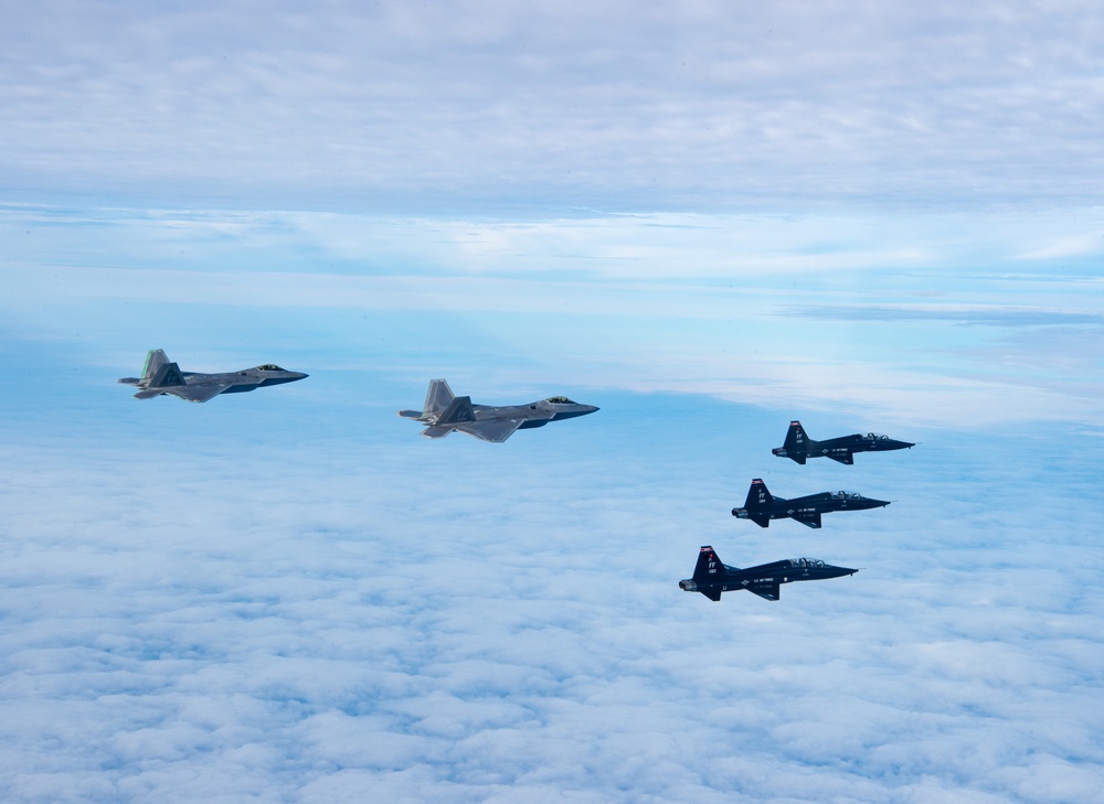 &quot;First to the Fight&quot;: F-22 Raptor and T-38 Talon train over Atlantic