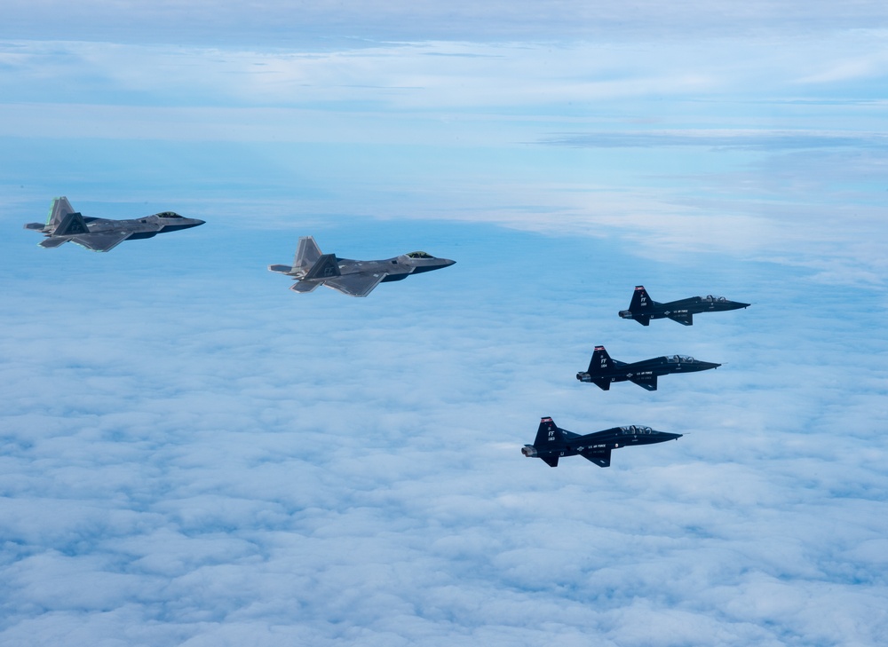 &quot;First to the Fight&quot;: F-22 Raptor and T-38 Talon train over Atlantic