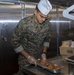 Marine serves food