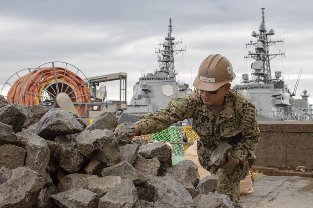 Seabees from NMCB-5's Detail Sasebo repair infrastructure on board Commander Fleet Activities Sasebo