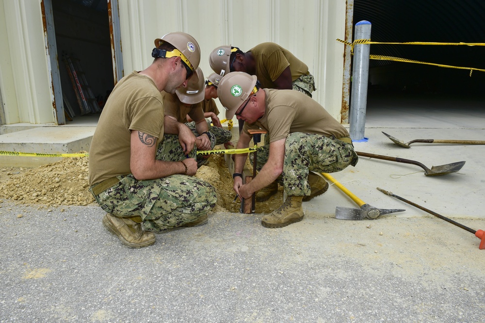 NMCB-5 Seabees start construction at the Material Liaison Office Central Tool Room Warehouse on board Camp Shields, Okinawa