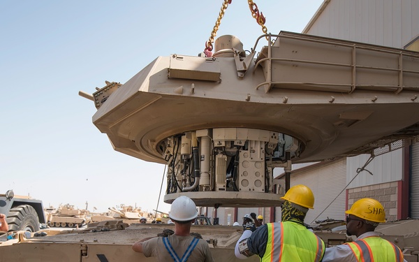 Lowering a turret on a tank