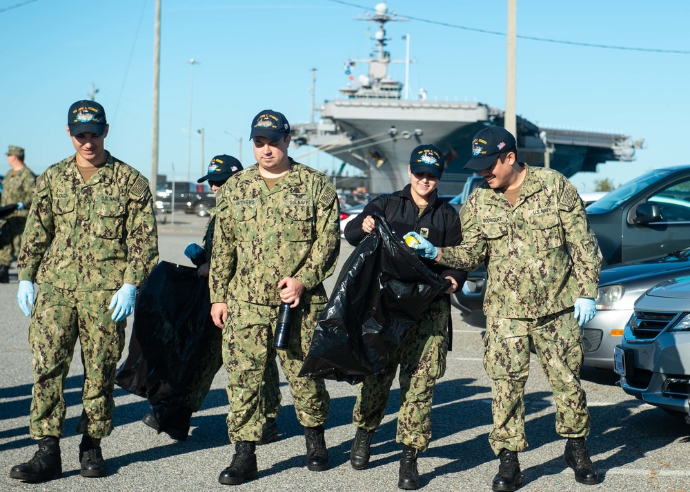 U.S. Sailors participate in a base clean-up on Naval Station Norfolk