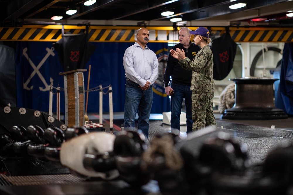 U.S. Sailor leads a tour