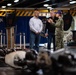 U.S. Sailor leads a tour