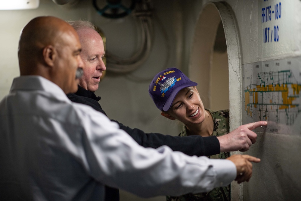 U.S. Sailor leads a tour